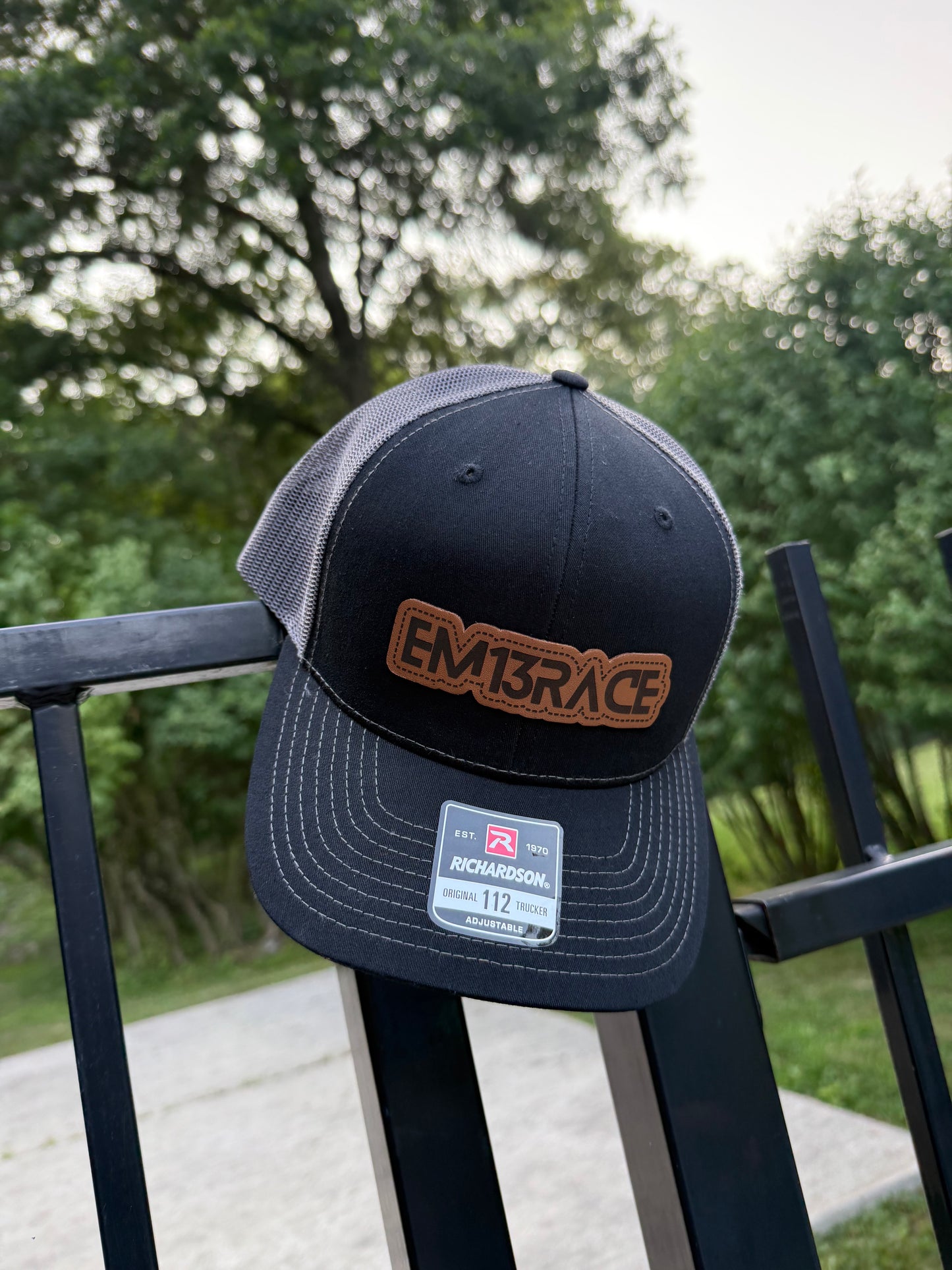 EM13RACE Trucker Hat