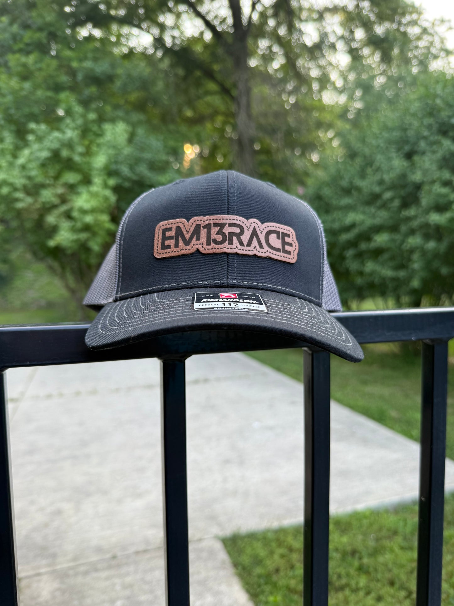 EM13RACE Trucker Hat